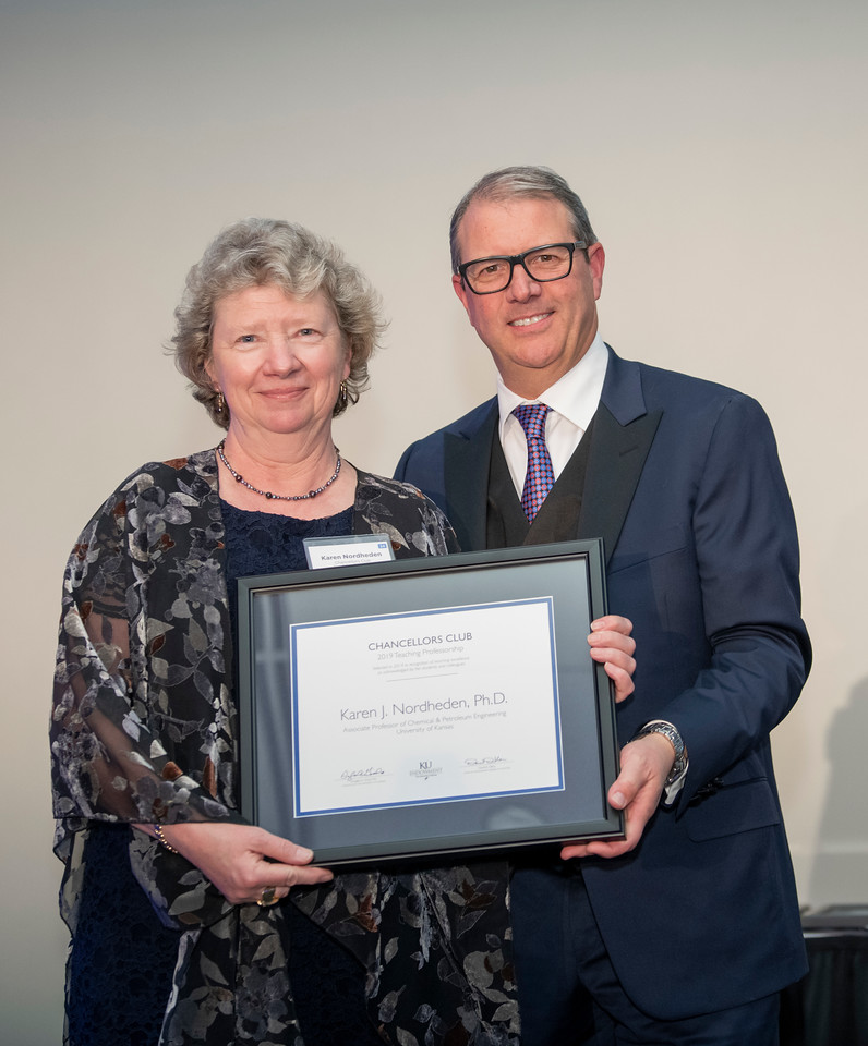Karen Nordheden receiving the Chancellor's Club Award pictured with Doug Girod