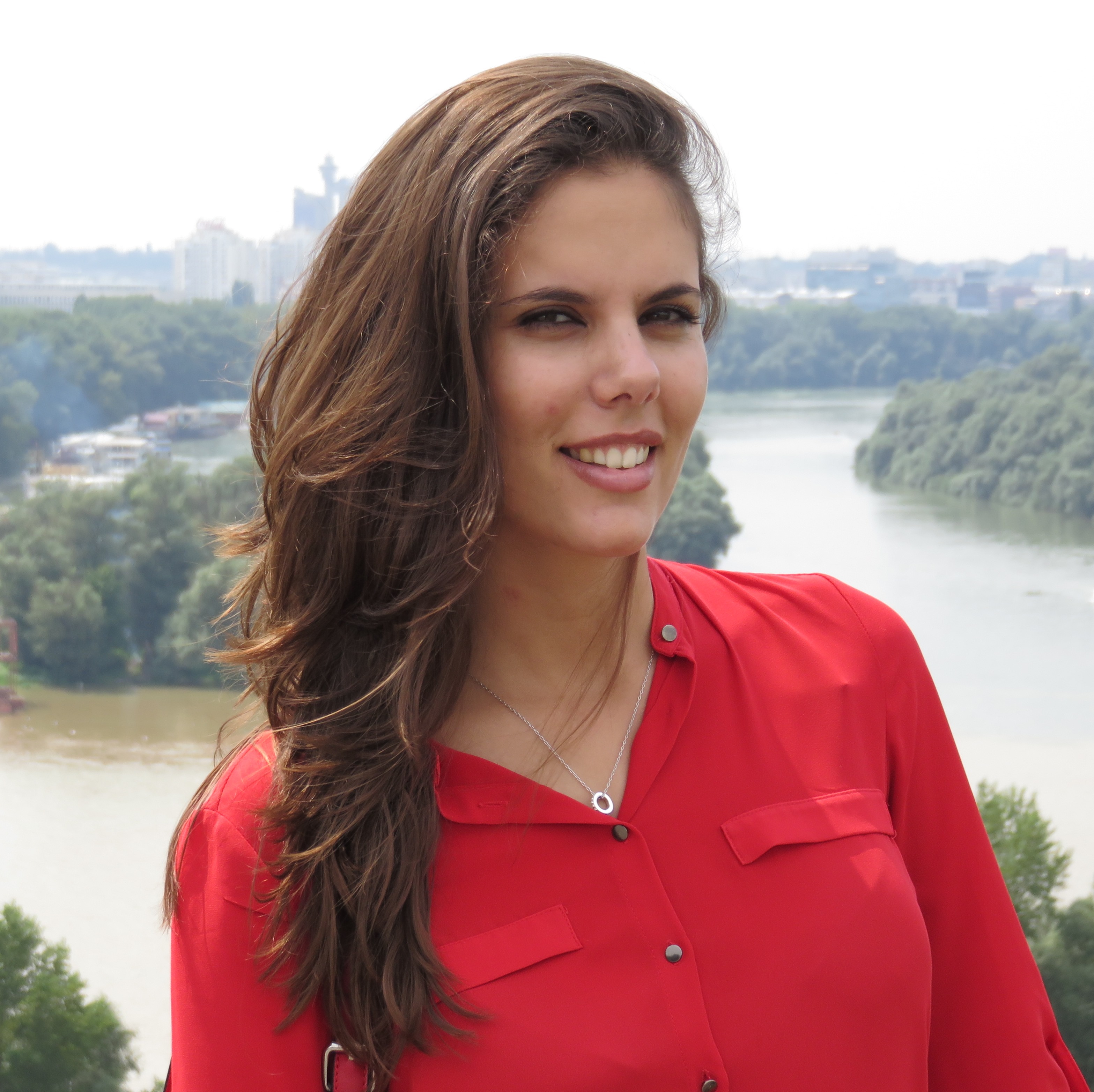 Ana Morais standing outside in front of a river