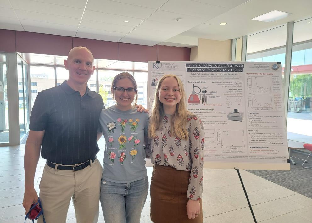 Julia with her graduate student mentor Abby and faculty mentor Mark Shiflett at the REU poster session