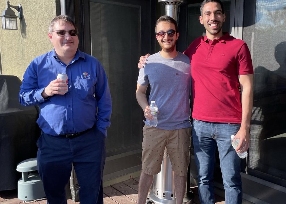 Professor Camarda and two graduate students pictured at the REU welcome picnic
