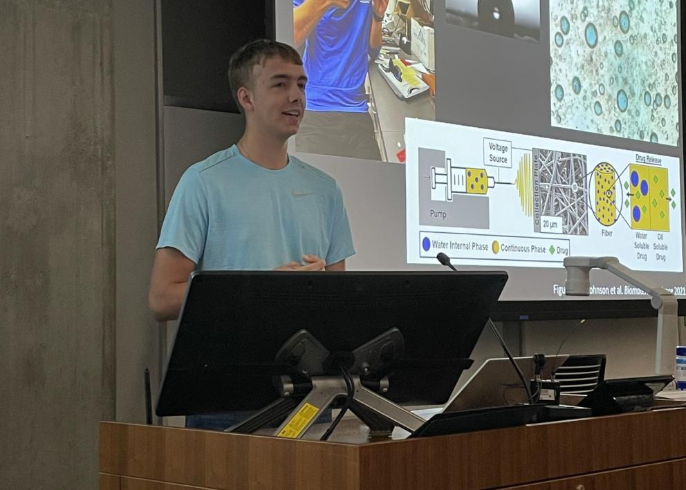 Student giving a PechaKucha style presentation
