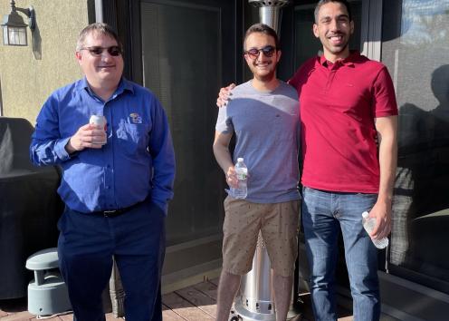 Professor Camarda and two graduate students pictured at the REU welcome picnic